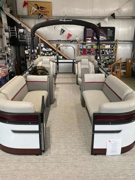 Slide: The Image of 2023 Qwest 824 E-Class RLS Triple Tube LTZ pontoon boat interior in showroom. - 4