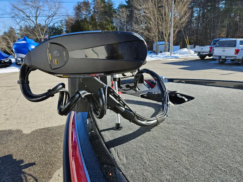 Slide: The Image of 2025 Skeeter ZXR21 boat with advanced trolling motor in a sunny outdoor setting. - 9