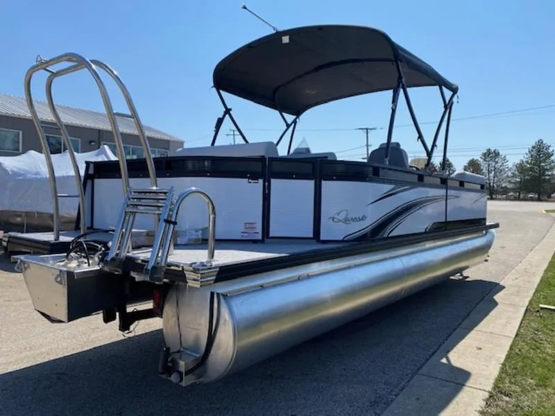 Slide: The Image of 2023 Qwest 824 E-Class Splash Pad pontoon boat with canopy and ladder. - 1