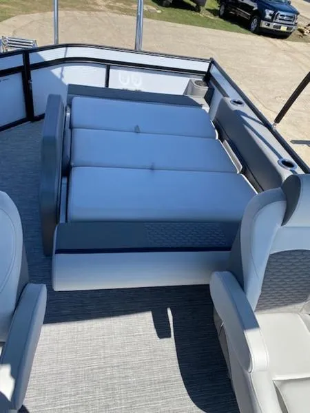 Slide: The Image of 2023 Qwest 824 E-Class Splash Pad Rw LTZ boat interior with cushioned seating. - 11