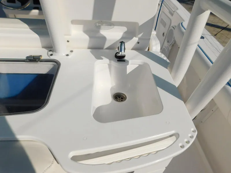 Slide: The Image of 2016 Everglades 355 Center Console boat sink and faucet detail. - 19