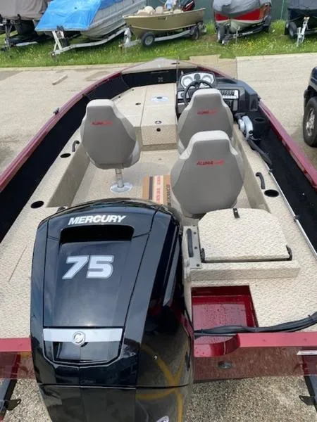 Slide: The Image of 2022 Alumacraft Competitor 165 CS boat with Mercury 75 engine, interior view. - 6