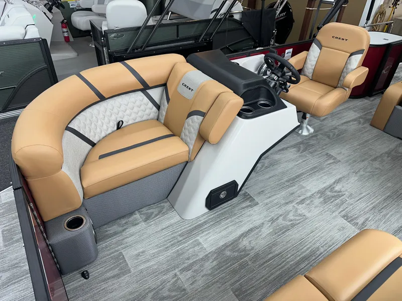 Slide: The Image of Luxurious interior of 2025 Crest Classic 200 boat with tan seating and modern helm. - 4