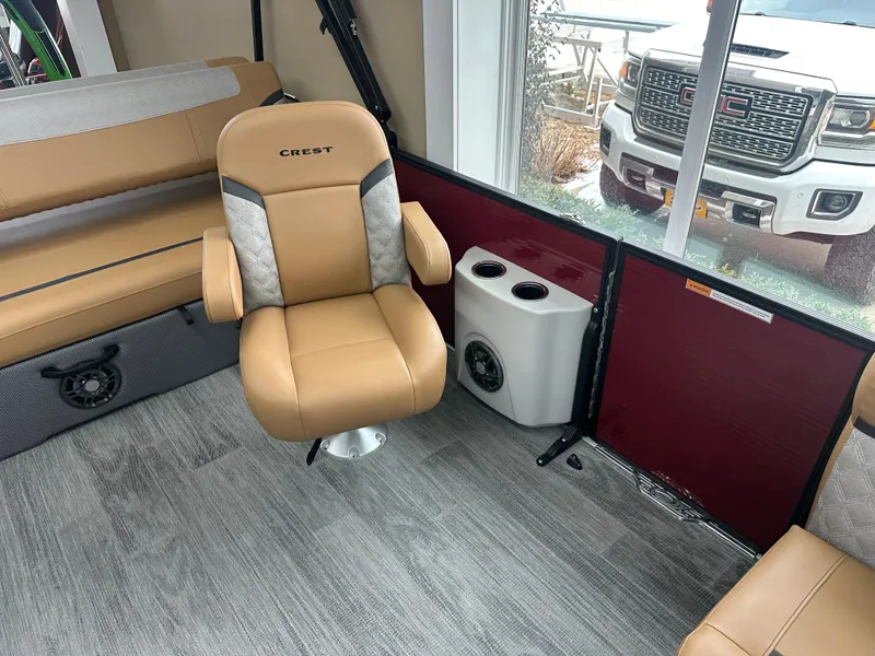 Slide: The Image of Interior of 2025 Crest Classic 200 boat with tan seating and modern design. - 5