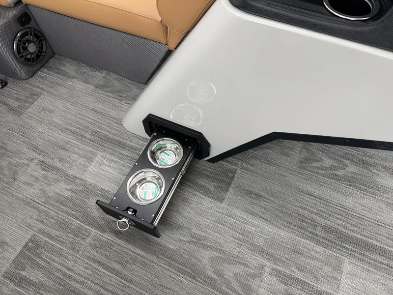 Slide: The Image of 2025 Crest Classic 200 boat interior with retractable cup holders and modern design. - 7