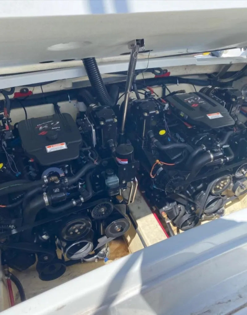 Slide: The Image of 2005 Formula 330 Sun Sport engine compartment with dual engines visible. - 14