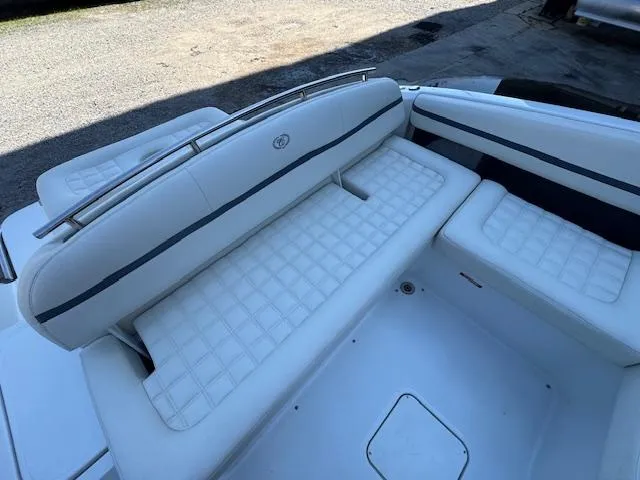 Slide: The Image of 2018 Cobalt R3 boat interior with white cushioned seating. - 14