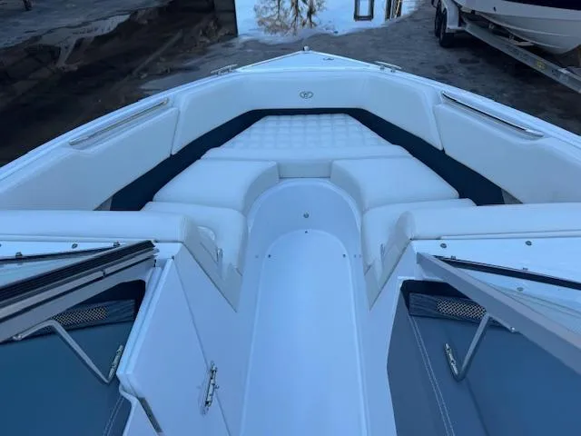 Slide: The Image of 2018 Cobalt R3 boat interior with white seating and sleek design. - 19