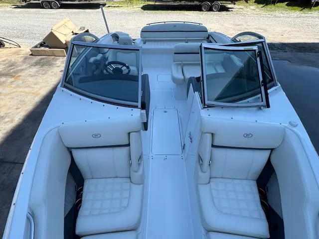 Slide: The Image of 2018 Cobalt R3 boat with white interior and open cockpit view. - 20