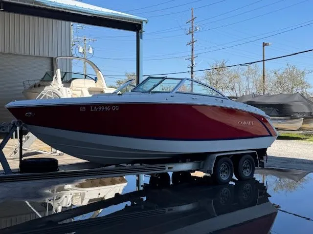 Slide: The Image of 2018 Cobalt R3 boat on trailer in marina setting. - 8