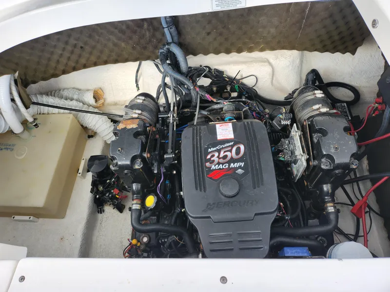 Slide: The Image of Engine compartment of 2007 Rinker 246 Captiva Cuddy with MerCruiser 350 MAG MPI. - 19