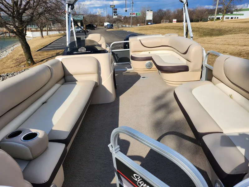 Slide: The Image of 2015 Sun Tracker Party Barge 20 DLX with spacious seating and cup holders. - 10