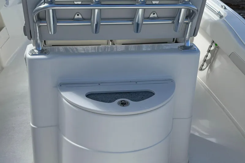 Slide: The Image of 2025 Key West 239FS boat interior with sleek white design and stainless steel accents. - 8