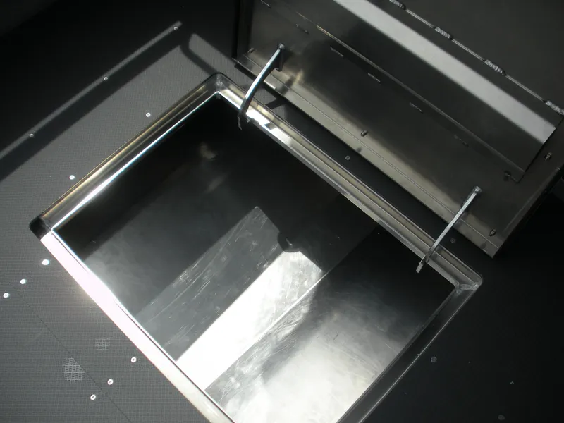 Slide: The Image of Open storage compartment in 2025 Duckworth 24 Pacific Pro boat. - 20