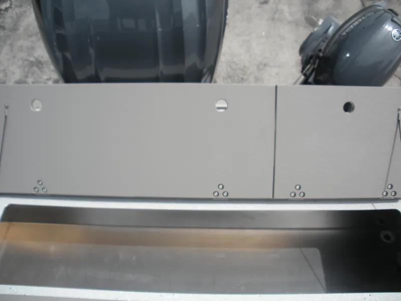 Slide: The Image of Duckworth 24 Pacific Pro 2025 boat deck with metal fittings and equipment. - 23