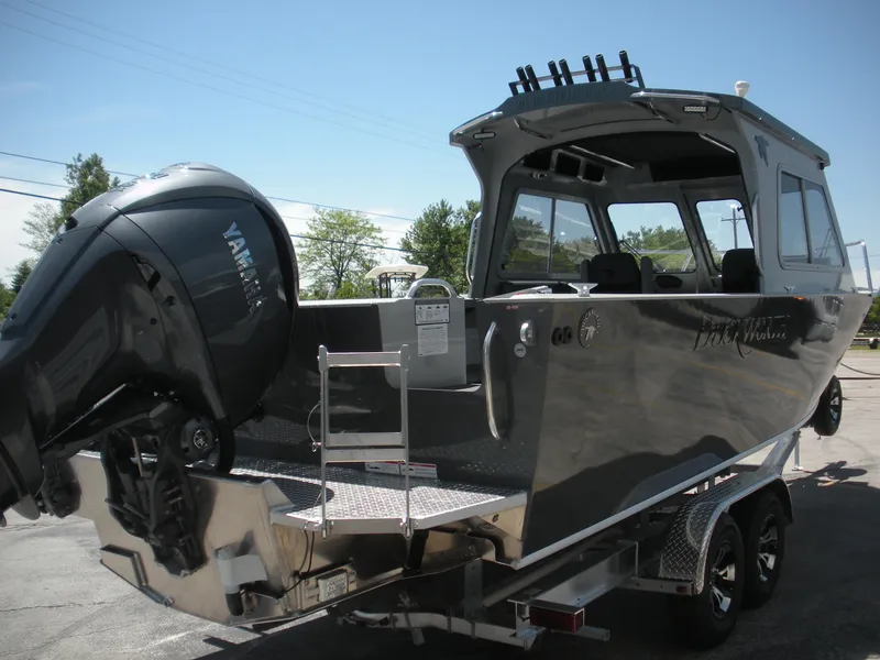 Slide: The Image of 2025 Duckworth 24 Pacific Pro boat with Yamaha outboard motor on trailer. - 27