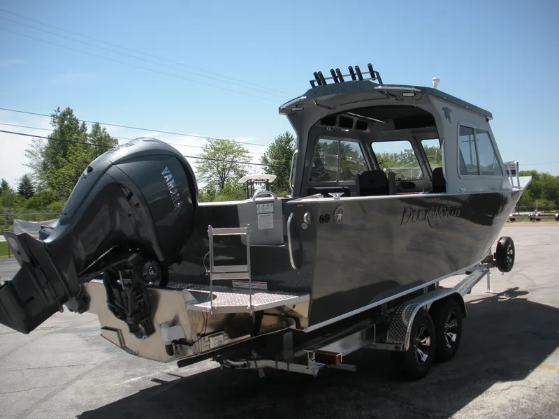 Slide: The Image of 2025 Duckworth 24 Pacific Pro boat on trailer with Yamaha outboard motor. - 28