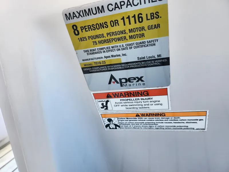Slide: The Image of Capacity label on 2018 Qwest LS 7518 Cruise FTL boat, detailing weight and safety warnings. - 23