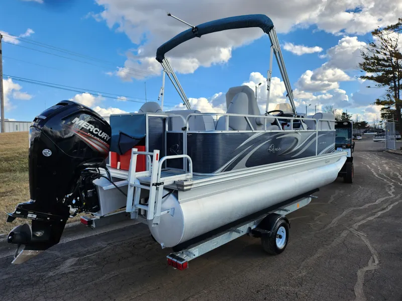Slide: The Image of 2018 Qwest LS 7518 Cruise FTL pontoon boat on trailer, featuring Mercury outboard motor. - 3