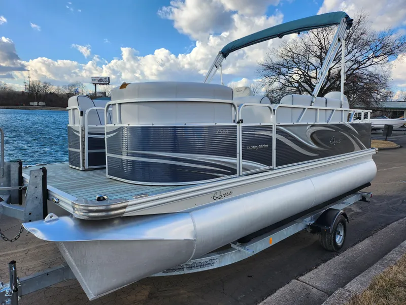 Slide: The Image of 2018 Qwest LS 7518 Cruise FTL pontoon boat on trailer by a lake. - 8