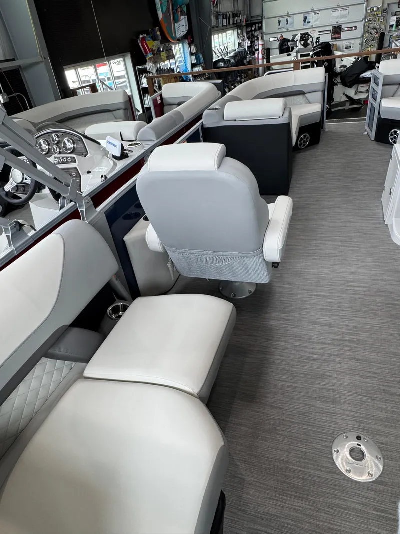 Slide: The Image of 2023 Lowe SS212 Walk-Through boat interior with modern seating and steering console. - 10