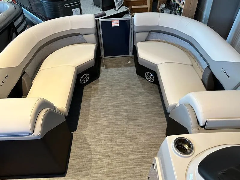 Slide: The Image of 2023 Lowe SF212 Walk-Through boat interior with spacious seating and modern design. - 4