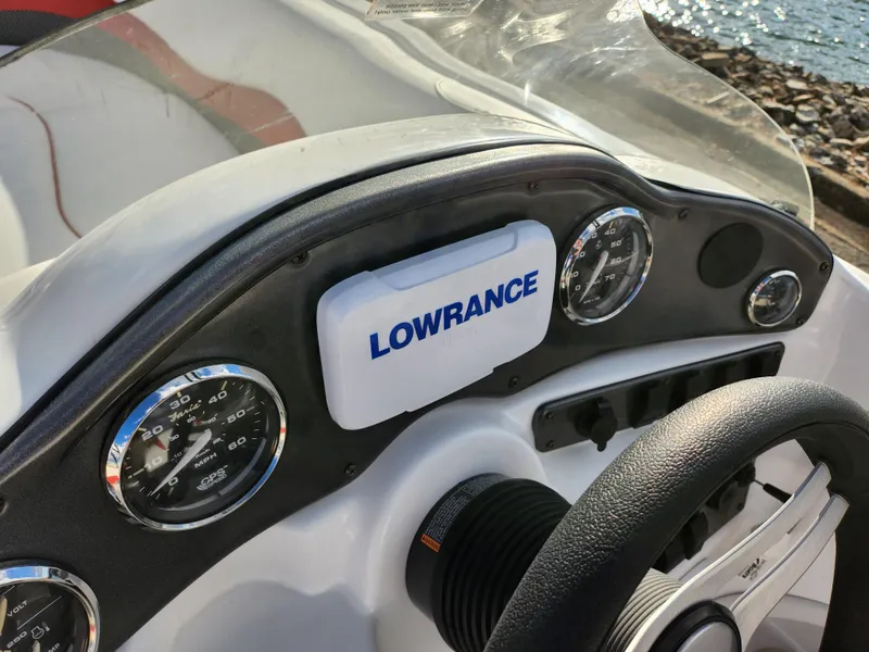 Slide: The Image of Dashboard of 2019 Hurricane SunDeck Sport 202 IO with Lowrance navigation system. - 14