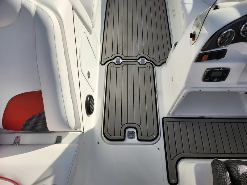 Slide: The Image of Interior view of 2019 Hurricane SunDeck Sport 202 IO boat with sleek seating and dashboard. - 15