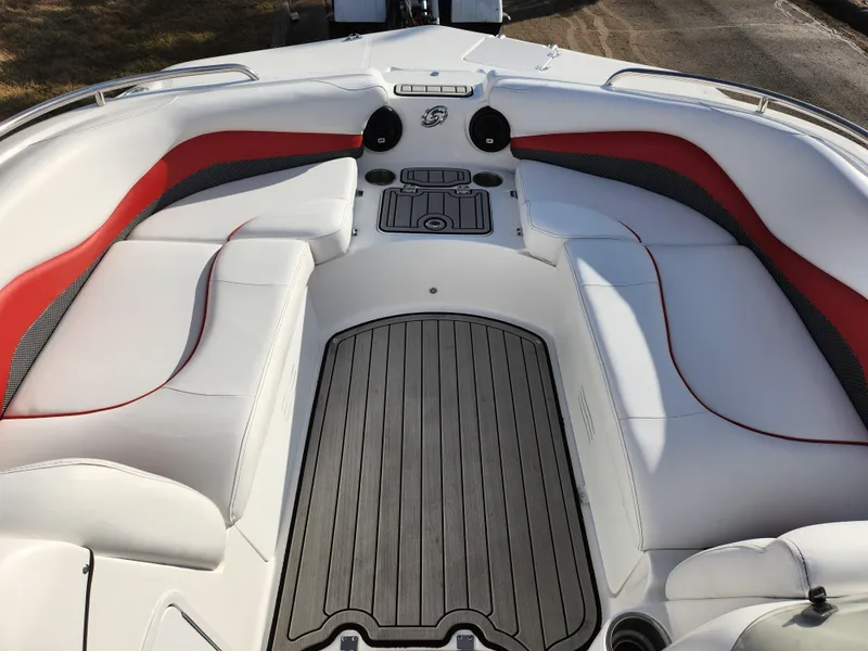Slide: The Image of 2019 Hurricane SunDeck Sport 202 IO boat interior with white and red seating. - 17
