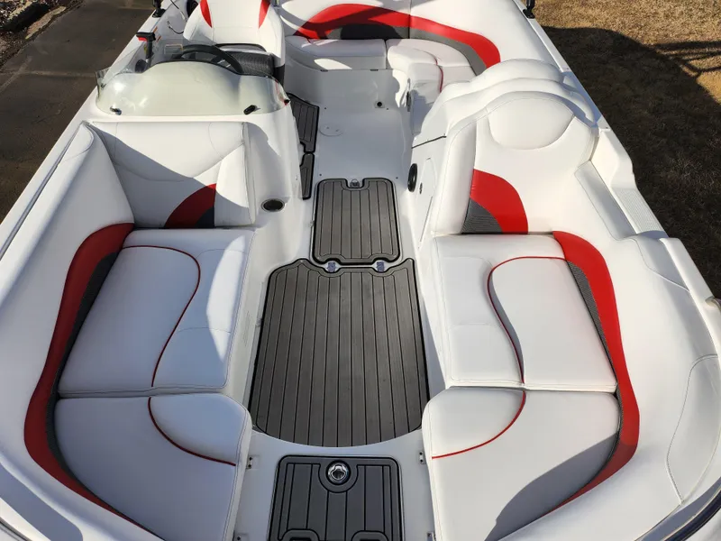 Slide: The Image of 2019 Hurricane SunDeck Sport 202 IO boat interior with white and red seating. - 19