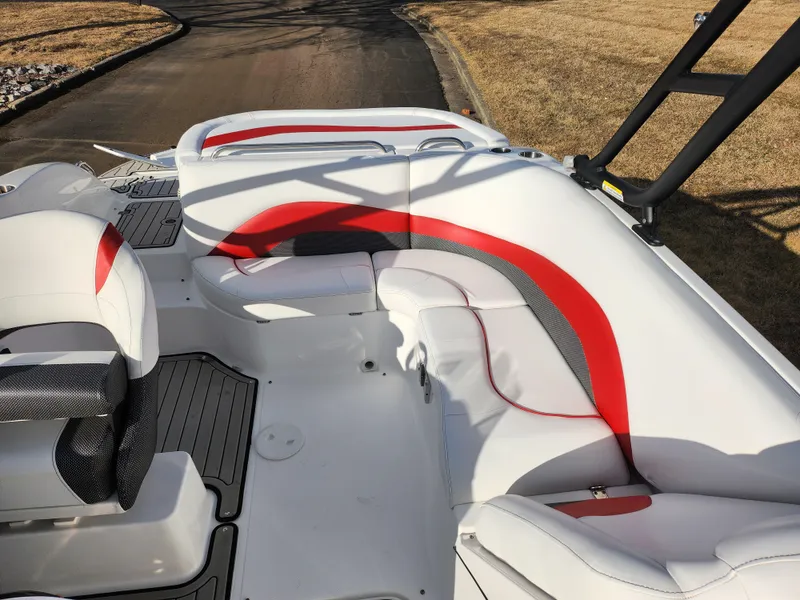 Slide: The Image of 2019 Hurricane SunDeck Sport 202 IO boat interior with white and red seating. - 22