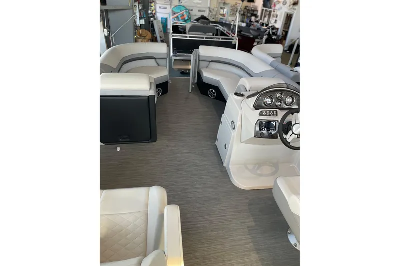 Slide: The Image of 2023 Lowe SS 210 WT boat interior with modern seating and control panel. - 4