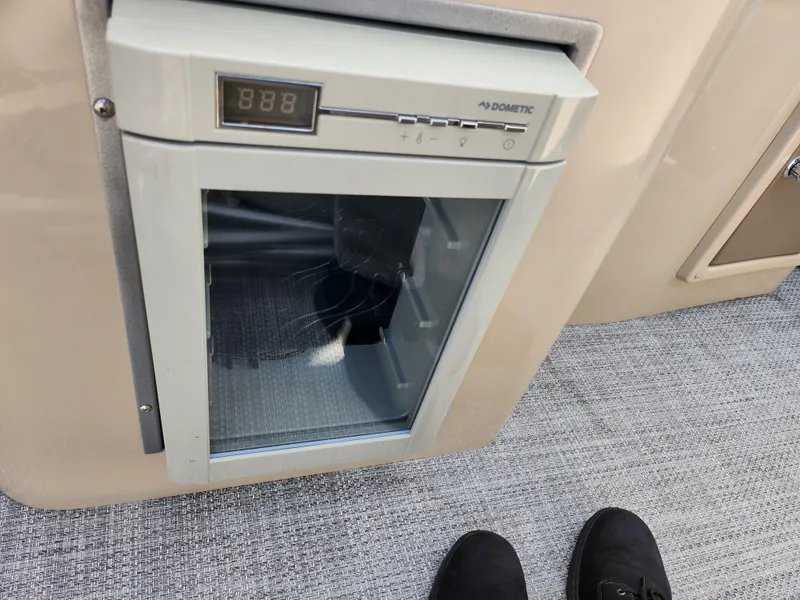 Slide: The Image of Built-in Dometic fridge on 2019 Premier 250 Grand Majestic RE boat. - 19