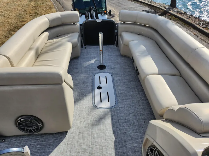 Slide: The Image of 2019 Premier 250 Grand Majestic RE pontoon boat with spacious seating and elegant design. - 27