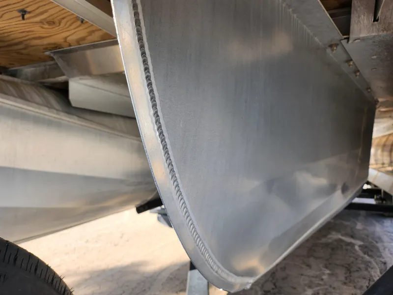 Slide: The Image of Close-up of 2019 Premier 250 Grand Majestic RE pontoon boat undercarriage. - 7
