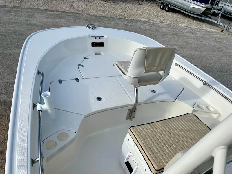 Slide: The Image of 2023 Boston Whaler 190 Montauk boat interior with seating and storage compartments. - 15
