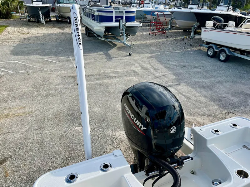 Slide: The Image of 2023 Boston Whaler 190 Montauk with Mercury engine at a marina. - 17