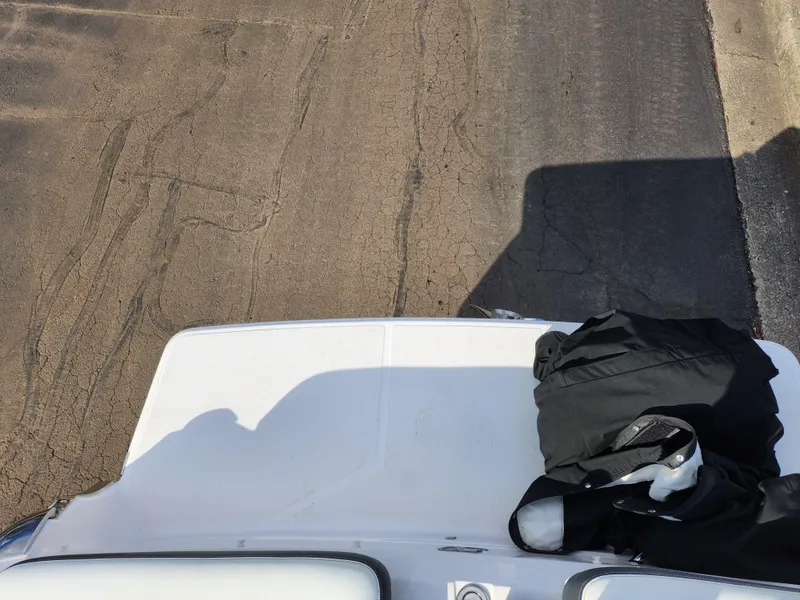 Slide: The Image of 2021 Regal LS2 boat with black bag on deck, viewed from above. - 29