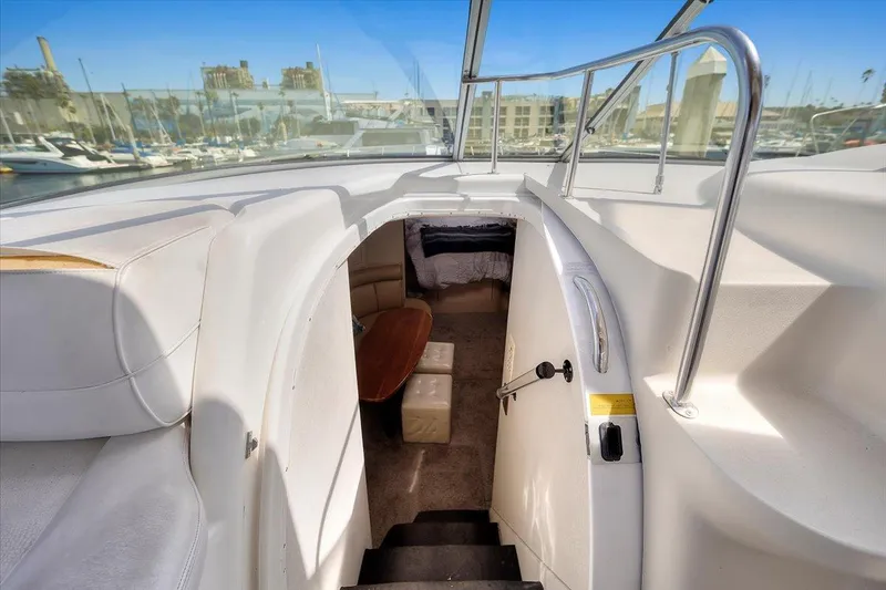 Slide: The Image of 1999 Cruisers Yachts 3870 Esprit interior view with stairs leading to cabin. - 16