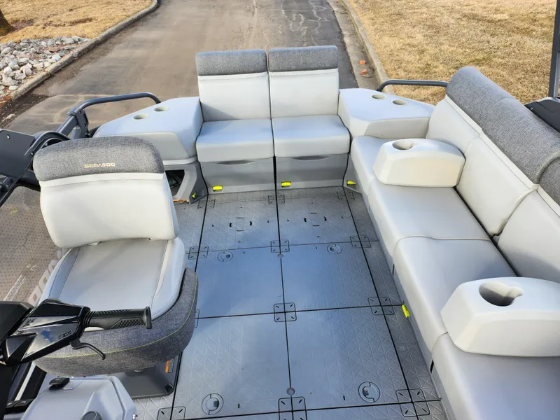 Slide: The Image of 2022 Sea-Doo Switch Cruise 21 interior with spacious seating and modern design. - 13