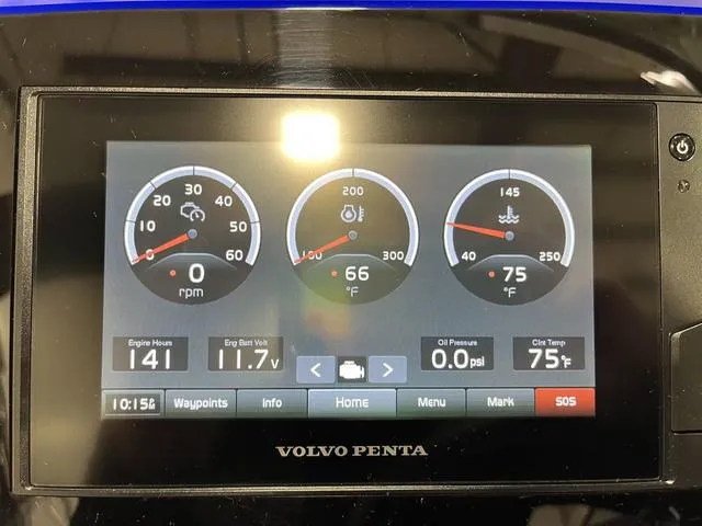 Slide: The Image of Volvo Penta display on 2020 Regal LS6 Surf showing engine metrics and gauges. - 18