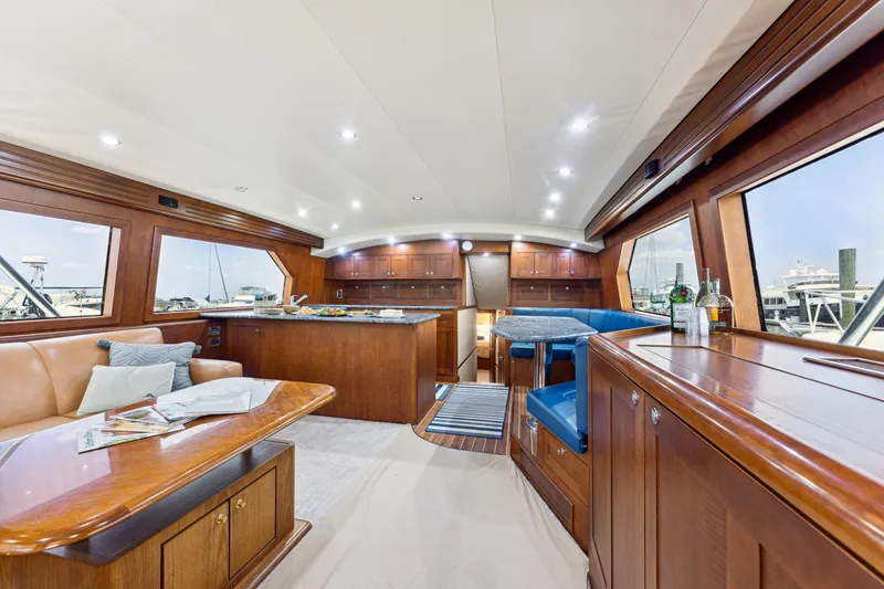 Slide: The Image of Interior of a 2012 Custom Sportfish yacht with luxurious wood finish. - 2