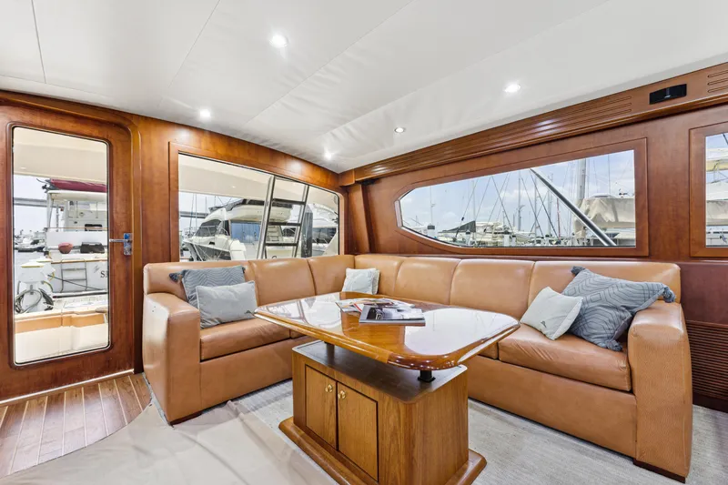 Slide: The Image of Interior of a 2012 Custom Sportfish yacht with luxurious wood finish. - 3