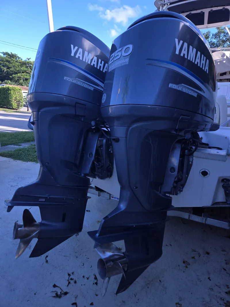 Slide: The Image of Twin Yamaha outboard motors on a 2001 Grady-White Sailfish 282 boat. - 8