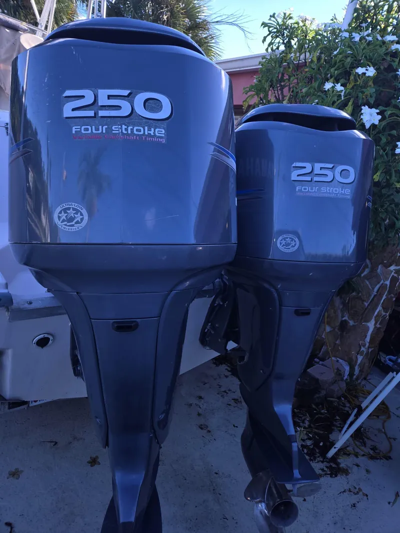 Slide: The Image of Twin 250 four-stroke outboard engines on a 2001 Grady-White Sailfish 282 boat. - 9
