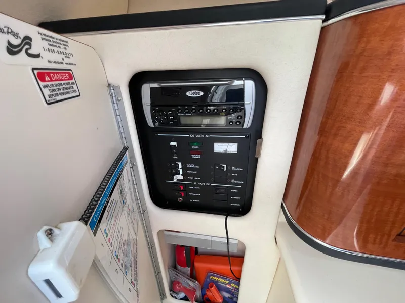 Slide: The Image of Interior control panel of 2004 Sea Ray 260 Sundancer boat with stereo system. - 11