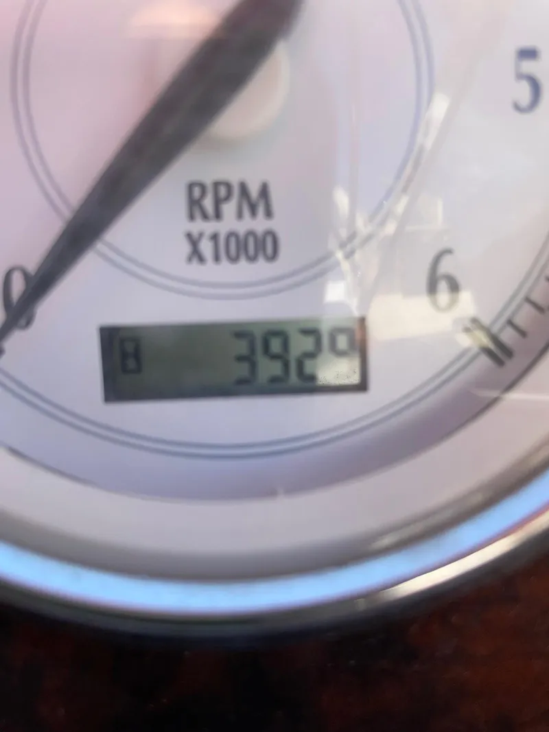 Slide: The Image of Close-up of a 2010 Regal 2565 Window Express tachometer showing 3929 RPM. - 19
