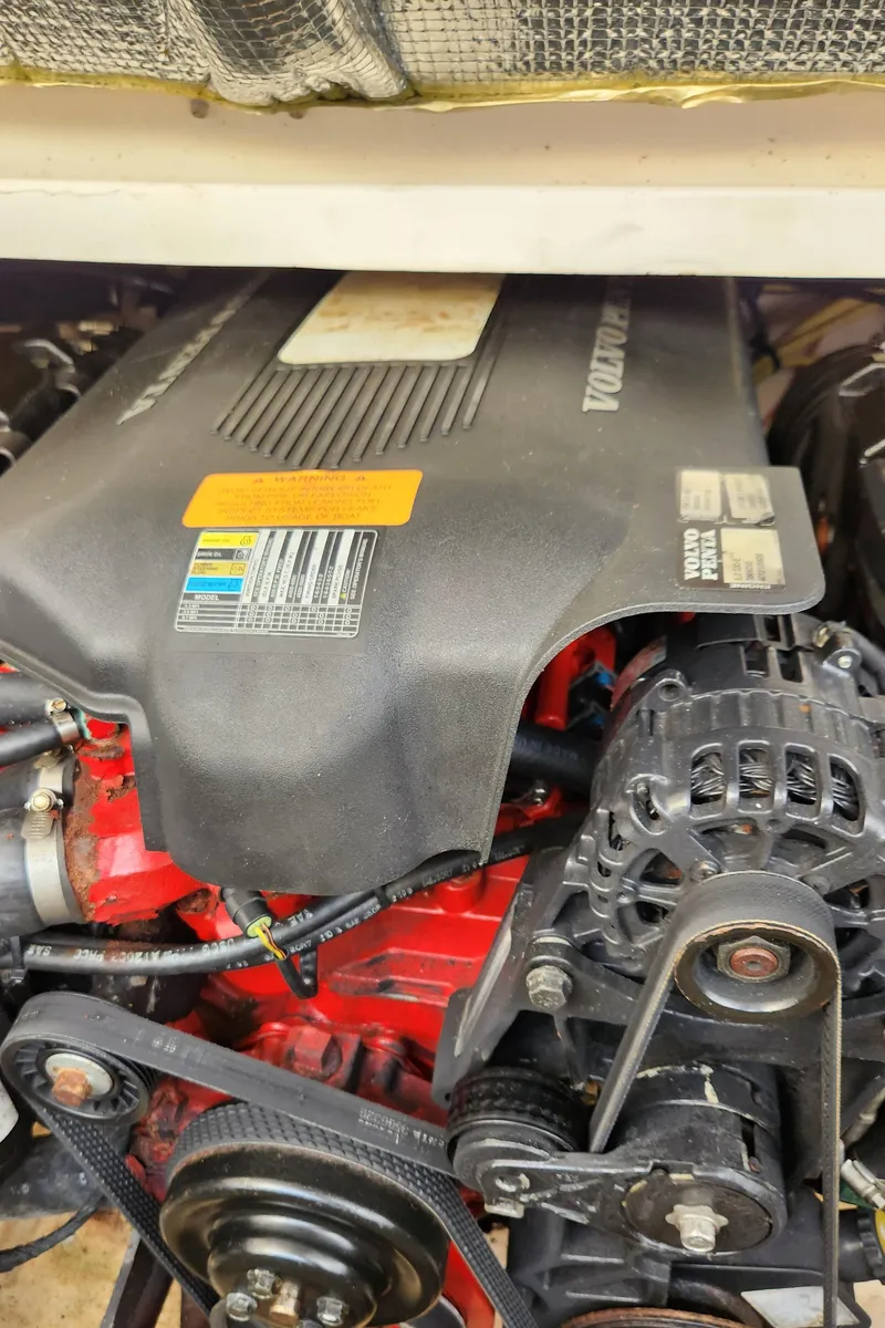 Slide: The Image of 2004 Chaparral Signature 290 engine close-up, showcasing components and details. - 16