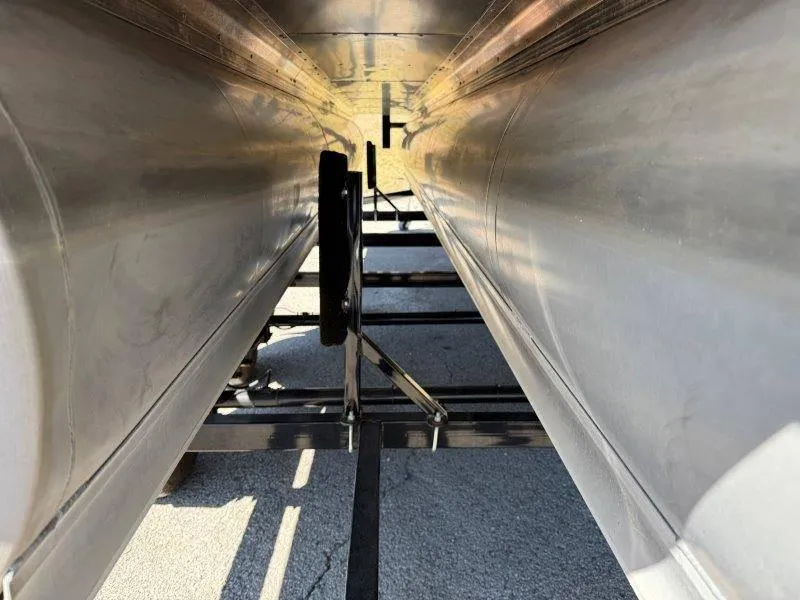 Slide: The Image of Underneath view of a 2022 Tahoe LTZ VRB 2485 pontoon boat on a trailer. - 18