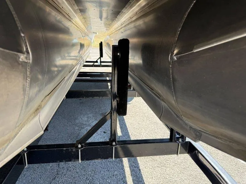 Slide: The Image of Close-up of 2022 Tahoe LTZ VRB 2485 pontoon boat undercarriage on trailer. - 19